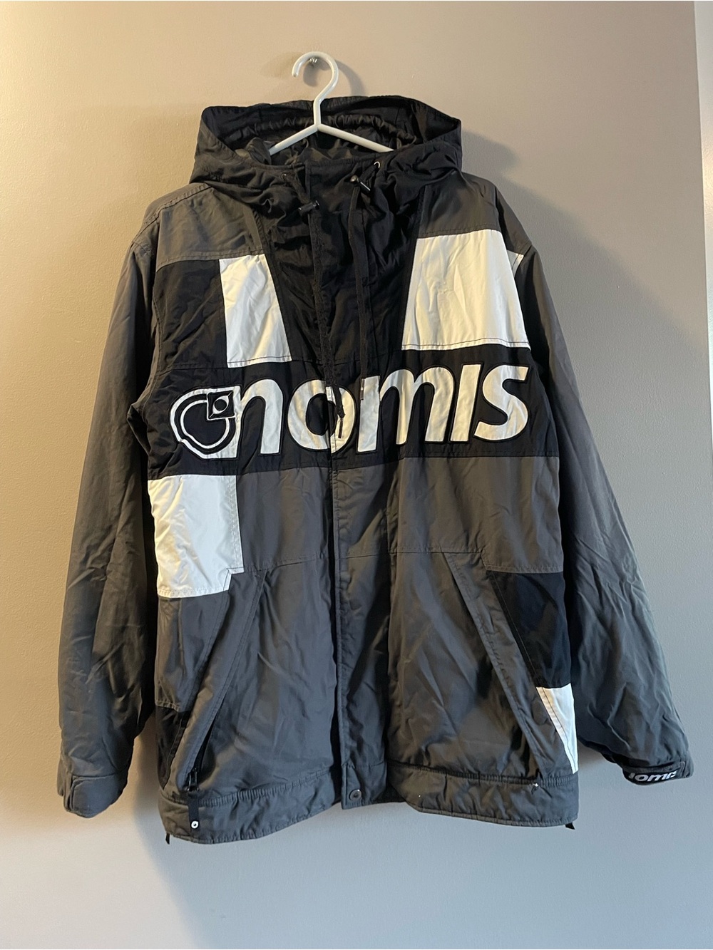 nomi Black & White Hooded Ski Jacket with Bold Logo